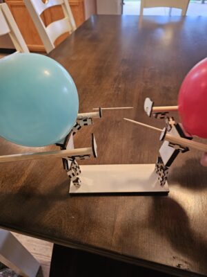 Descarga vector - Pelea de globos - Corte Láser