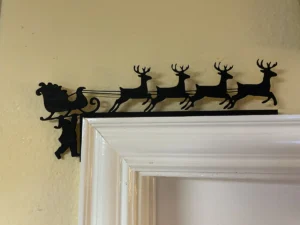 Descarga - Santa en perfil de puerta - Corte Laser